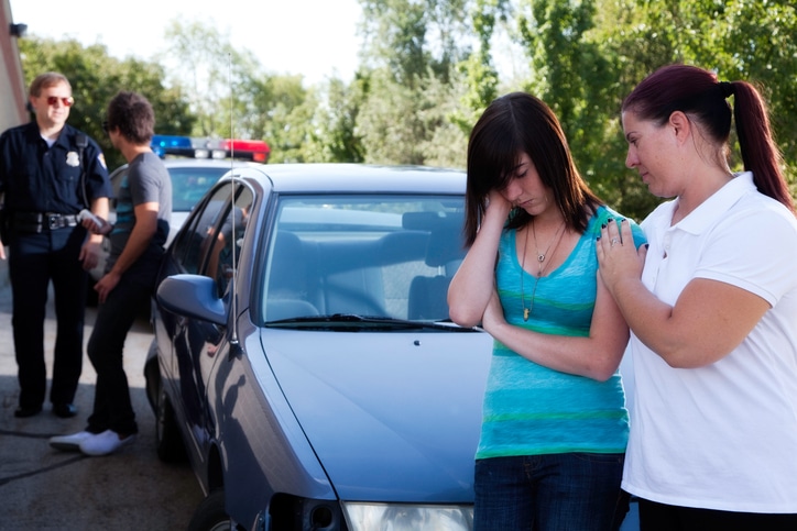 Mother Comforts Daughter After Accident or Police Stop