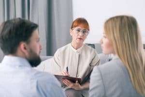 man-and-woman-discussing-parenting-plan