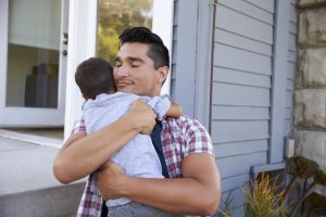 father-hugging-son